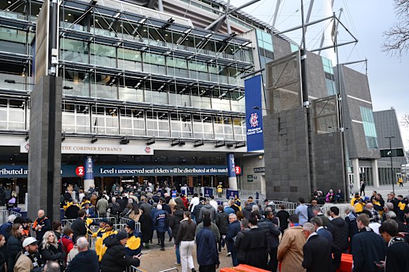 Fans line up outside the MCG.