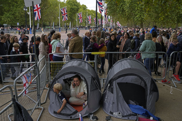 Mourners along The Mall, in London.