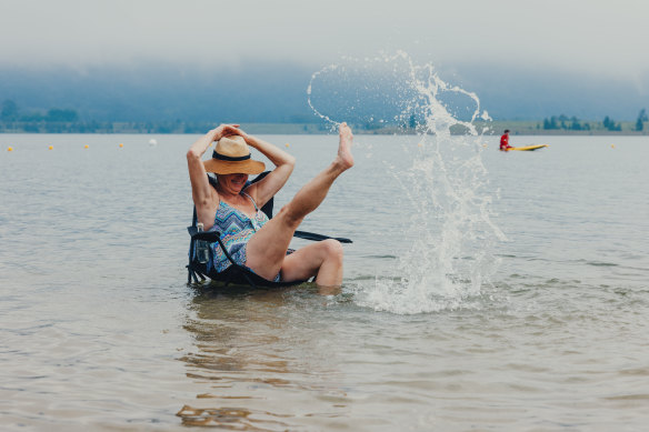 One of the first beachgoers, Lidia Jaszczyszyn, enjoying the waters shortly after the opening of Penrith Beach on Saturday.