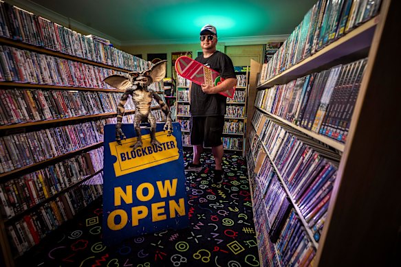 Mark Bishop inside his home video store. 