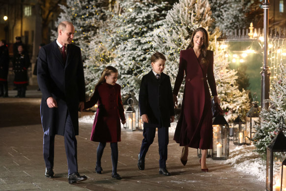 Prince William and his wife Catherine arrive with their children Charlotte and George  for the “Together at Christmas” Carol Service.