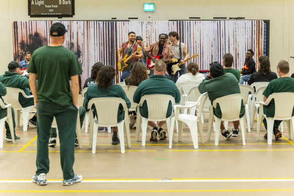 The cast of <i>Big Name, No Blankets</i> performing inside a Victorian prison. 