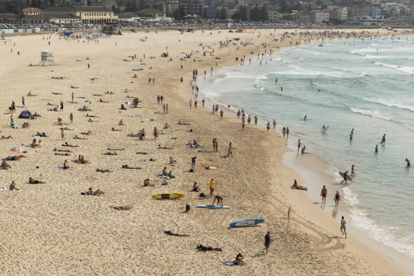 A 45-year-old Chinese national will face court over allegedly sexually touching three teenagers while swimming at Bondi Beach.