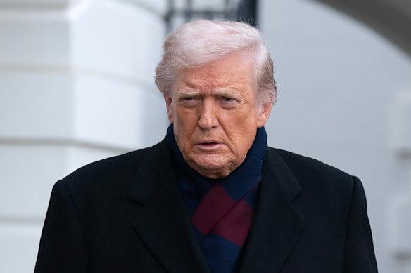 President Donald Trump talks to reporters on Saturday outside the White House. 