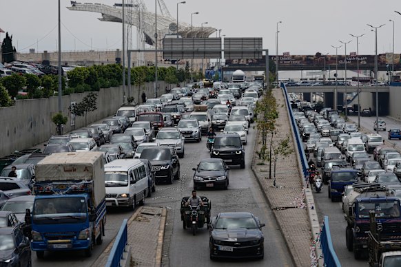 Thousands flee from Dahiyeh in Beirut’s southern suburbs following Israeli Prime Minister Benjamin Netanyahu’s announcement that Israel would soon launch air strikes.