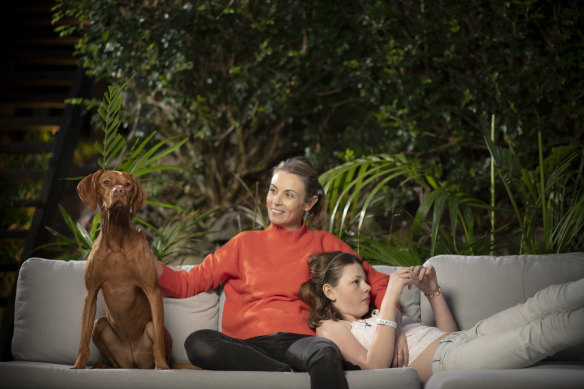 Anna Howard with her daughter Holly and Ginger the dog at their home in St Ives. 