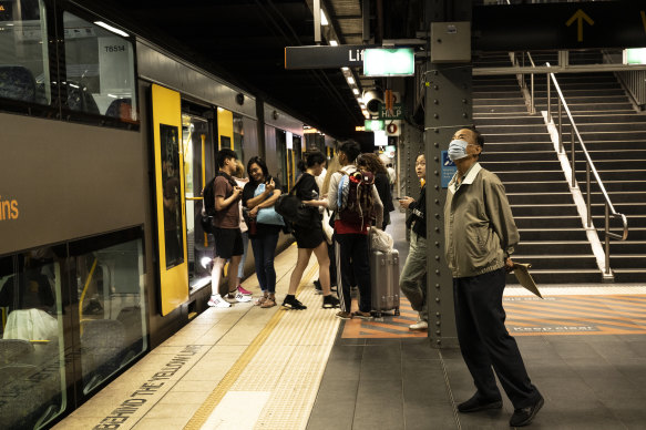 Commuters at Town Hall station.