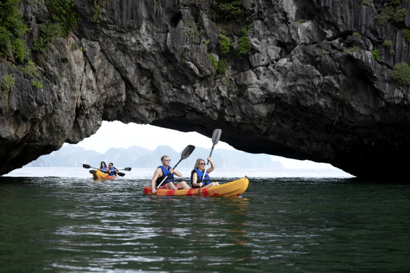 Kayakers exploring the bay off the Ylang.