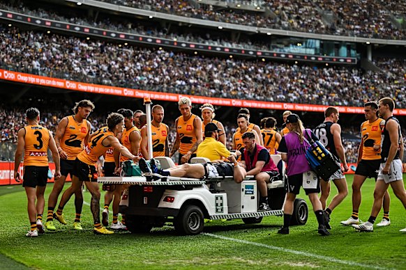 Jacob Weitering is taken off on a stretcher.