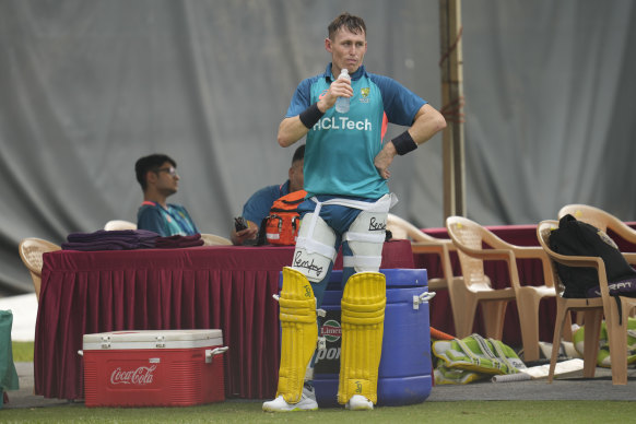 Marnus Labuschagne rehydrates at training.