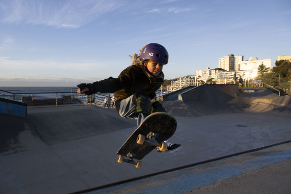 Mila McDonald, 9, doing an air out at Bondi Skate Park.
