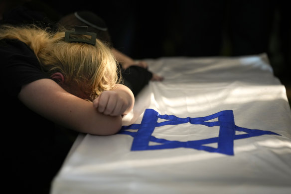 A mourner at a funeral in Jerusalem after the October 7 Hamas attacks that killed more than 1200 Israelis.