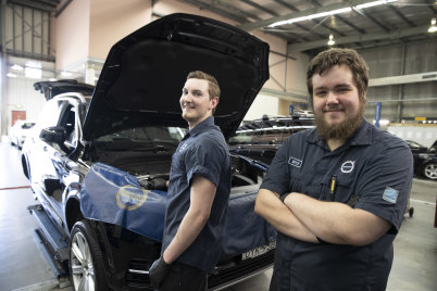 Mitchell Evans (front) and Jordan Stansfield (left) are apprentices at Volvo Parramatta. 