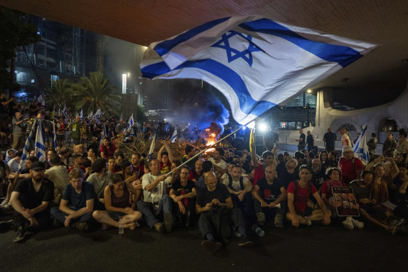 Protesters blocked roads in Tel Aviv to call for a deal to release the hostages held by Hamas.