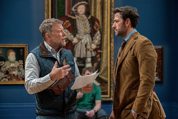Guy Ritchie (left) and John Krasinski behind the scenes on Fountain of Youth, which was filmed in locations such as England, Egypt and Austria.