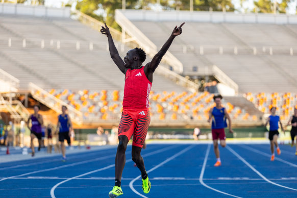 Gout Gout eases across the finish line while his competitors are still finishing the 200m race.