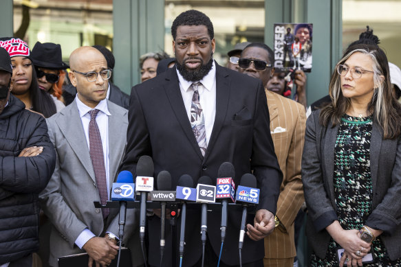 Flanked by family members, lawyers and supporters, Dexter Reed’s father, Dexter Reed snr, speaks to reporters outside the headquarters for the Civilian Office of Police Accountability in West Town, Chicago.