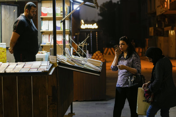 A bookseller on Mutanabi Street.