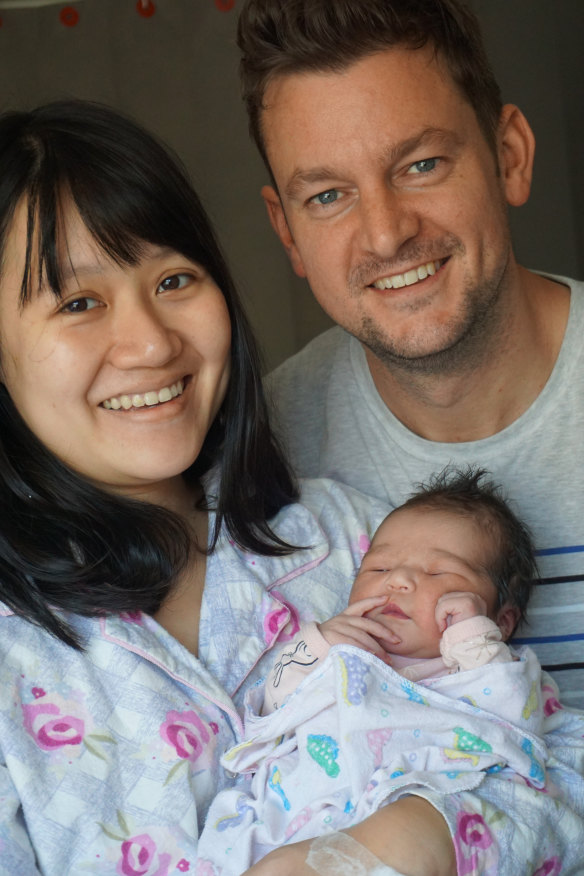 Chris and Evelyn with their daughter, Kora. They like the mishmash of cultures in Australia. 