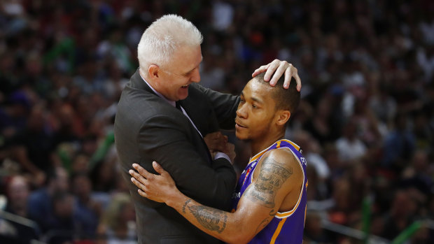 All's well: Kings coach Andrew Gaze congratulates Jerome Randle after the Kings ended their season with a flourish.