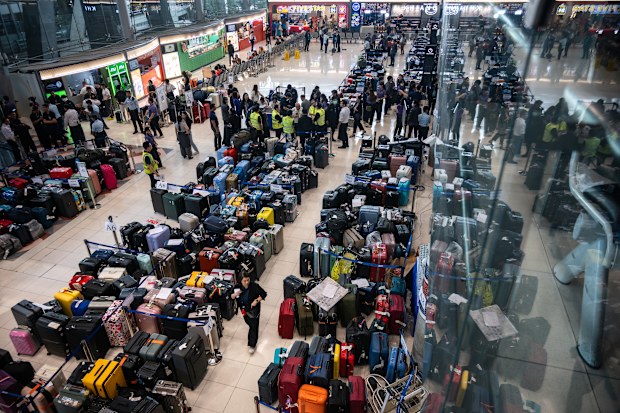 Large pile of unclaimed baggage at Suvarnabhumi Airport (BKK) on September 29, 2026 in Bangkok, Thailand.