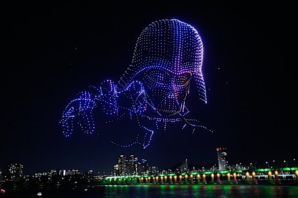 Star Wars themed drones show in the night sky to celebrate Star Wars Day at a park along the Han River in Seoul, South Korea.