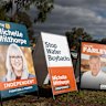 The battle of orange: the rival independent and One Nation signs in the Farrer byelection.
