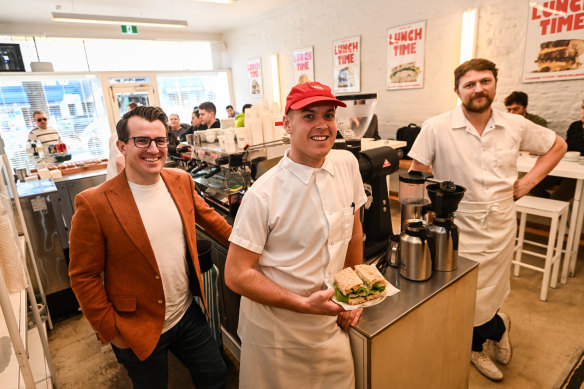 A four-day week is now in place for Hector’s Deli employees such as Sam Hooper (centre), pictured with CEO Adam Brownell (left) and founder Dom Wilton.