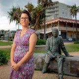 Arlene Mehan with the Edmund Barton statue in Port Macquarie.  Arlene is leading a campaign to have the statue removed from a local park, which is also the site of an  Aboriginal burial ground. 