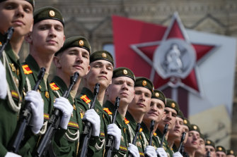 Russian servicemen march during a dress rehearsal for the Victory Day military parade in Moscow on Saturday, May 7.
