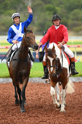 Blake Shinn and Alligator Blood after winning the Futurity Stakes.