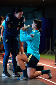 Matildas physician Brandi Cole with Sam Kerr in the gym.