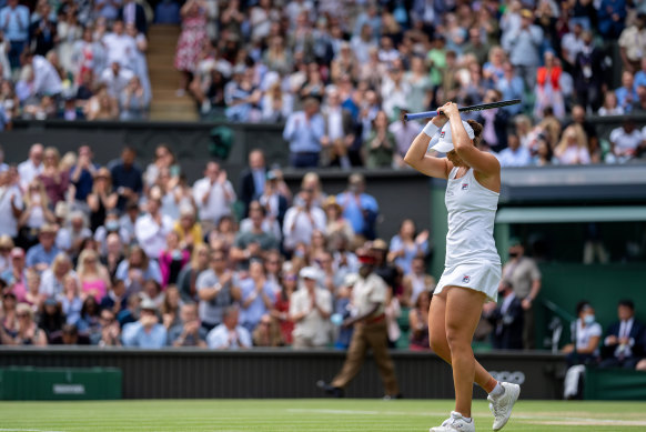 Ashleigh Barty soaks up the moment after beating Angelique Kerber in their semi-final.