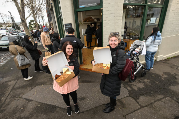 Crystal Hilgemann and Belinda Allen with their last cakes.