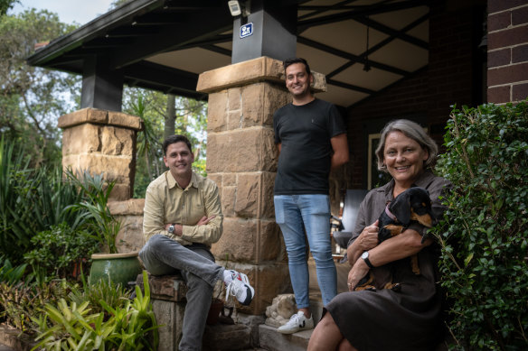 Kate Roberts and her sons Alastair (right) and Hugo Fisher at their Croydon family home, which will go to auction next month.