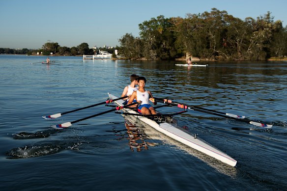 Rowers from Leichhardt Rowing Club, founded in 1886, train on the Iron Cove course.