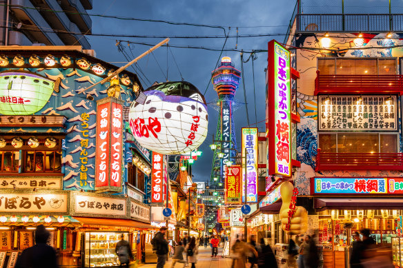 Shinsekai District, wth the Tsutenkaku Tower in the background, Osaka, Japan.