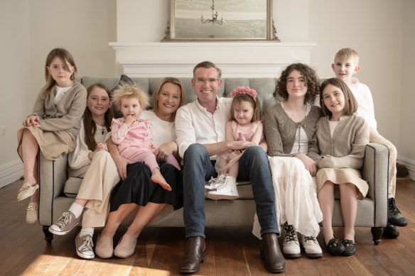 Former premier Dominic Perrottet at home with wife Helen and the couple’s seven children. 