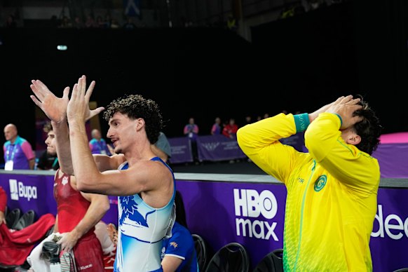 Moment of victory: Australia's Jesse Moore (right) after finishing first.