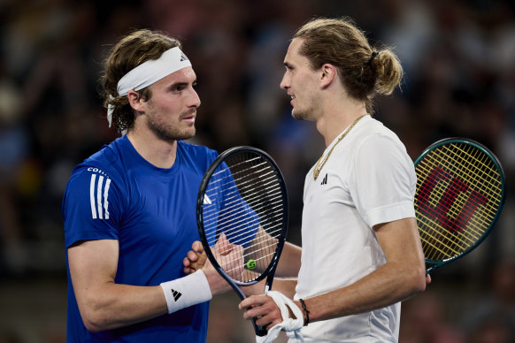 Alexander Zverev shakes hands with Stefanos Tsitsipas.