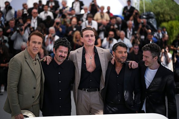 Nicolas Cage, from left, director Lorcan Finnegan, Alexander Bertrand, Justin Rosniak and writer Thomas Martin pose for photographers at the Cannes photo call for the film The Surfer.