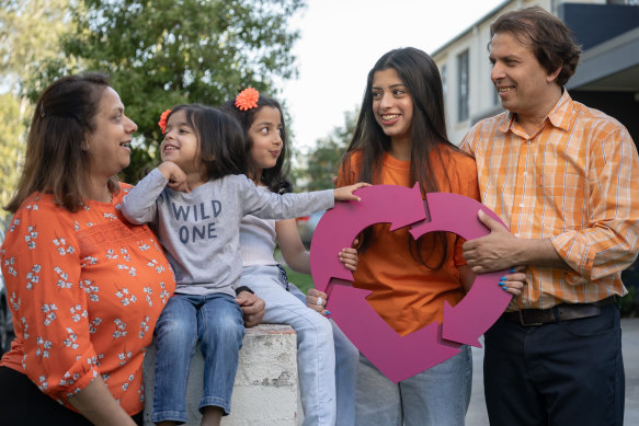 From left: Mili Udani with her daughters Nishtha, 3, Nami, 5, Naisha, 17, and her husband Rupesh. 