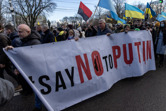 An anti-war rally in Kyiv on Saturday as US President Joe Biden and his Russian counterpart Vladimir Putin spoke by phone.