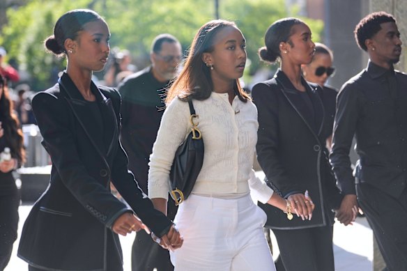 Family and supporters of Sean “Diddy” Combs arrive to the courthouse in New York on Monday. 