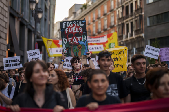 Tens of thousands of climate activists marched in Madrid and around the world at the weekend to call for an end to the burning of planet-warming fossil fuels as the globe suffers dramatic weather extremes and record-breaking heat. 