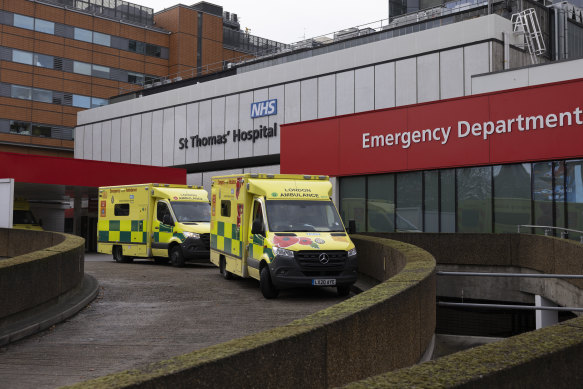 Ambulances line up at St Thomas’  Hospital in London. Britain recorded a surge of Omicron cases  in recent weeks, though death rates have been lower than in previous infection waves.