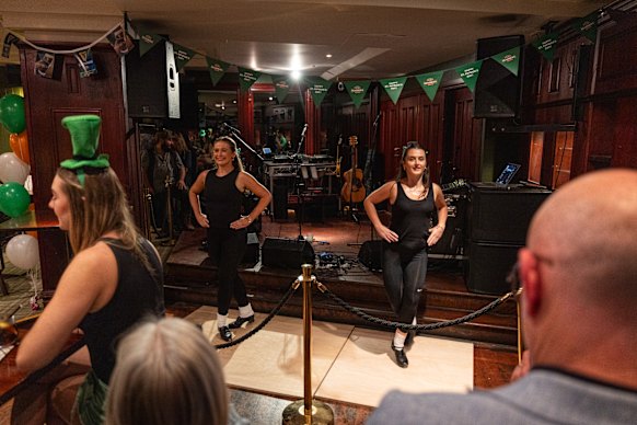 Irish dancers Bronagh (left) and Emer Maguire perform at the Harp and Hound.