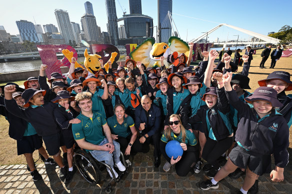 Wynnum State School pupils with Olympians and Paralympians Eithen Leard (wheelchair basketball), Emily Seebohm (swimming), Patrick Johnson (athletics) and Raissa Martin (goalball) celebrate eight years to go until Brisbane 2032.