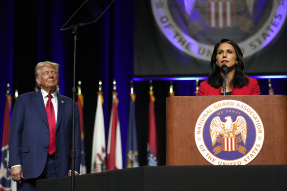 Donald Trump campaigns with Tulsi Gabbard in Detroit in August.
