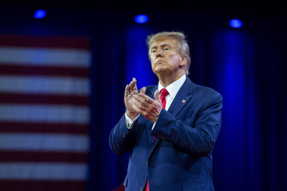 Donald Trump applauds as he departs after speaking at CPAC. His was the last speech of the event, which closed with Mass.